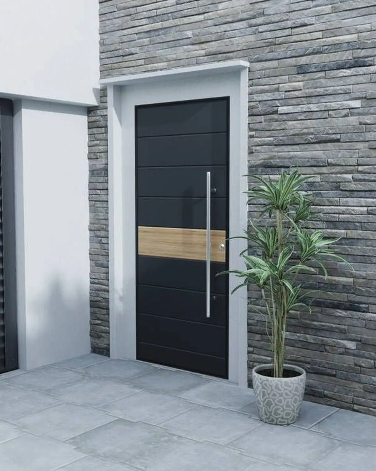 Porte d’entrée contemporaine gris anthracite, à poignée longue, sur une façade en pierre